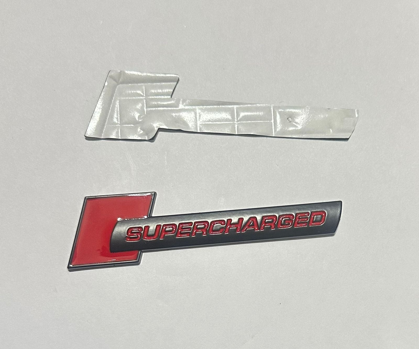 Supercharged- Black RED Sign Sticker Car Bike Metal Supercharged Logo Car Emblem Premium 3D Badge (10 x 2.6cm) Auto Racing Sport Sticker Grand Tourer Decal