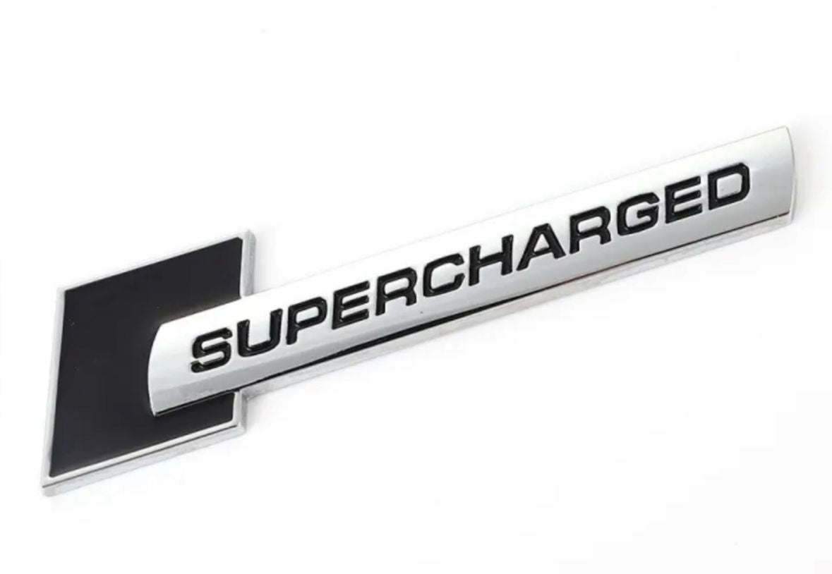 Supercharged (1PC) Logo Chrome Black. 10 x 2.6cm Car Bike Metal Supercharged Logo Car Emblem Premium 3D Badge Auto Racing Sport Sticker Grand Tourer Decal