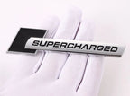 Supercharged (1PC) Logo Chrome Black. 10 x 2.6cm Car Bike Metal Supercharged Logo Car Emblem Premium 3D Badge Auto Racing Sport Sticker Grand Tourer Decal