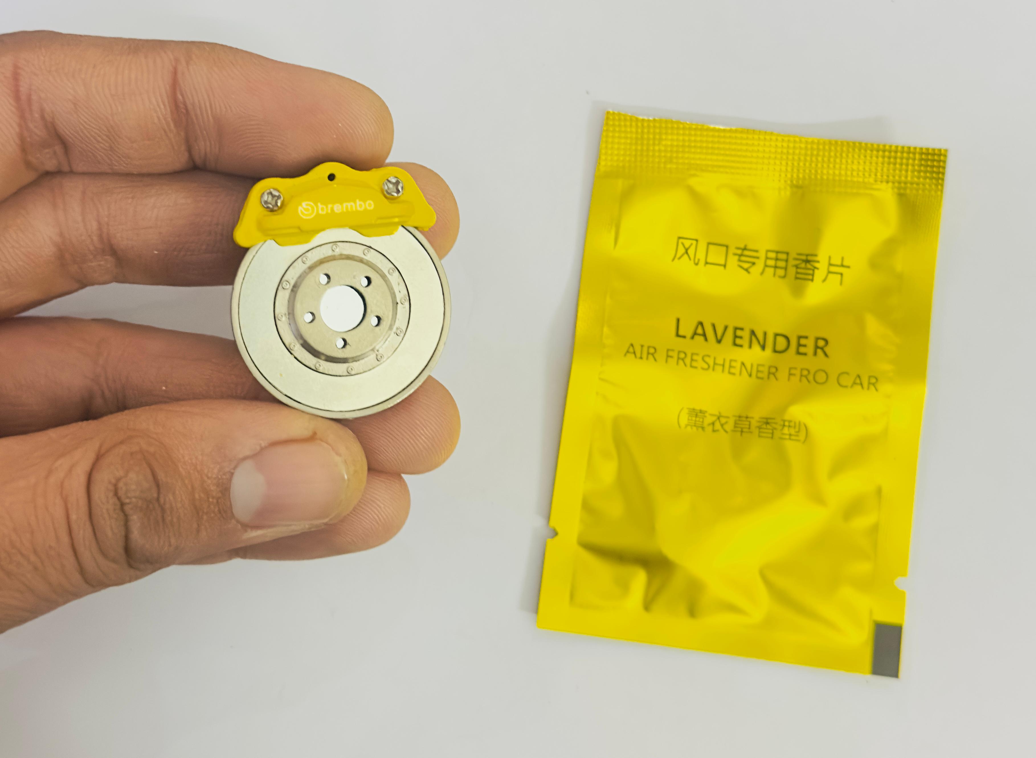 Yellow WHEEL DISC AC Vent Perfume ABS Body Car Design Organic Fragrance Air Freshener Perfume-1 Piece