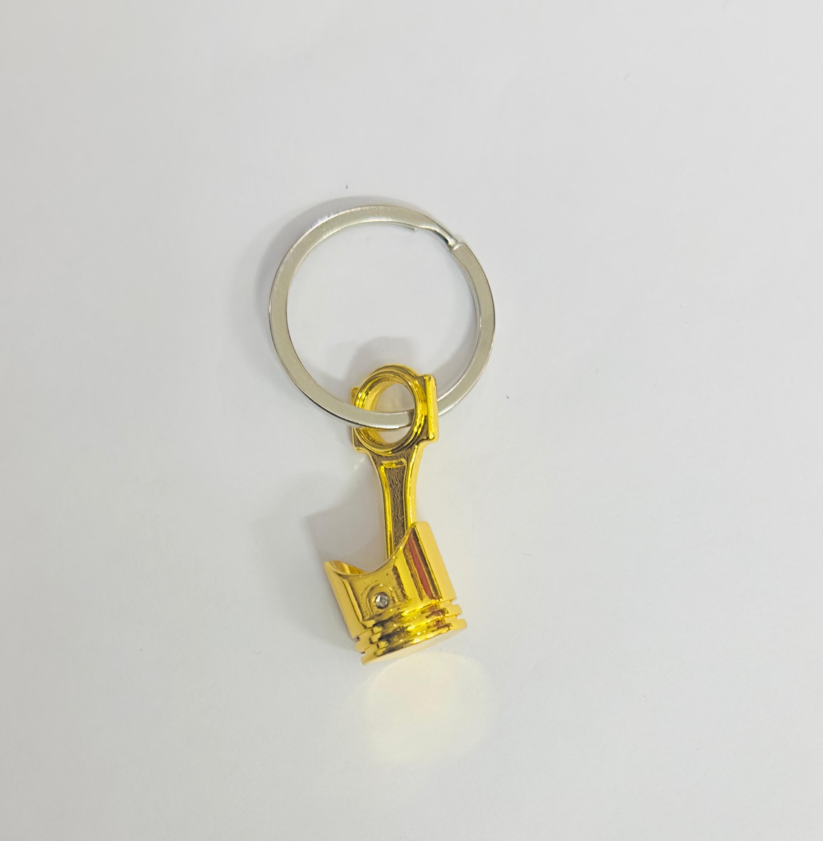 Golden Piston Design Metal Keychain Car Styling Keychain Piston Key Ring Durable Metal Key chain Pendant Ring.