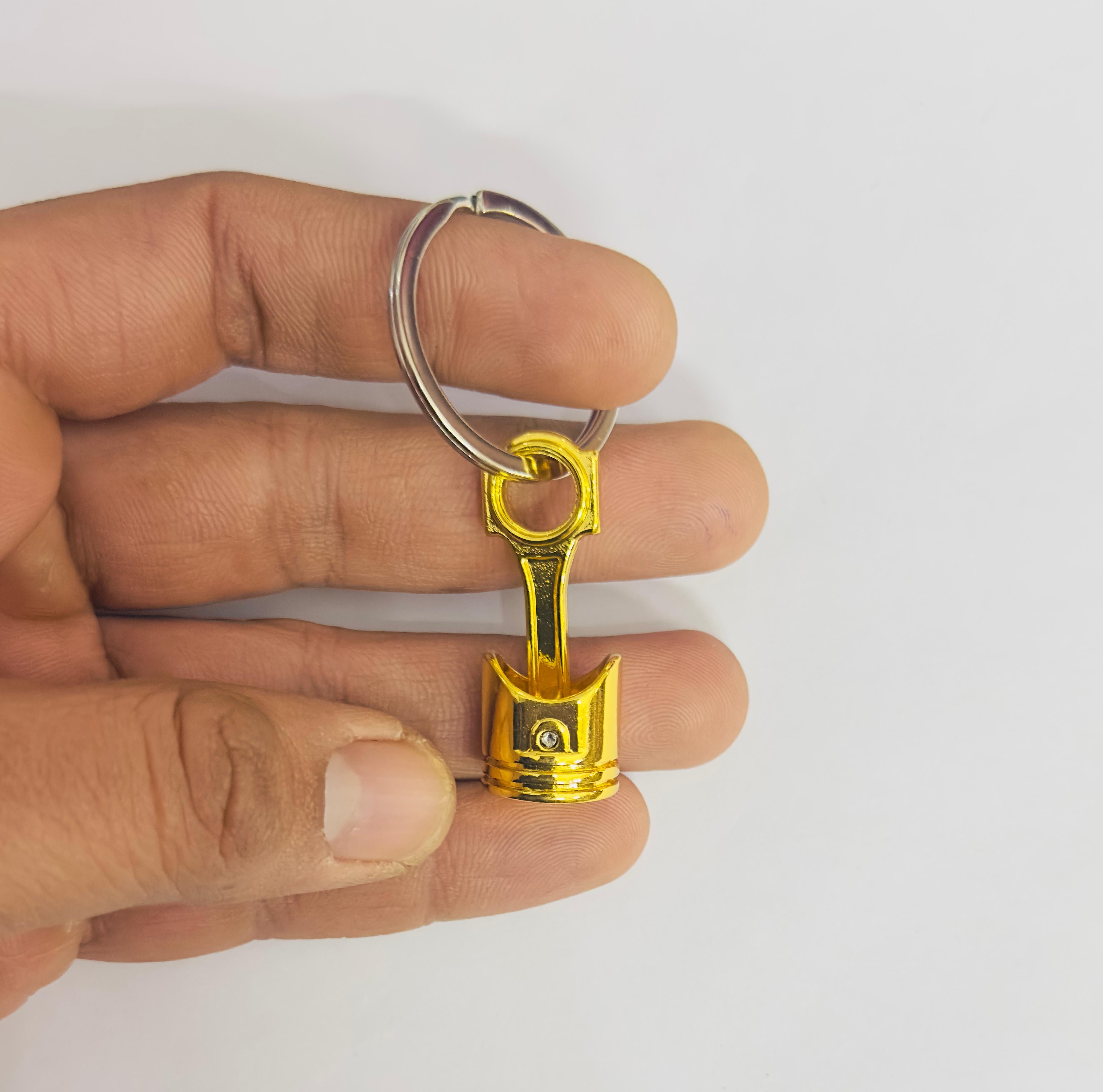 Golden Piston Design Metal Keychain Car Styling Keychain Piston Key Ring Durable Metal Key chain Pendant Ring.